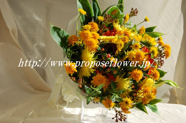ひまわりとヒメヒマワリの花束 ドイツマイスターの花束専門店 プロポーズフラワーショップ